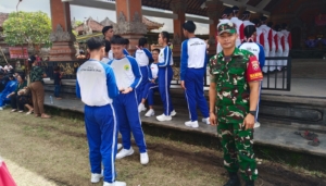 Babinsa Singakerta Dukung Dunia Pendidikan, Amankan Lomba Senam Anak Indonesia Hebat di Ubud