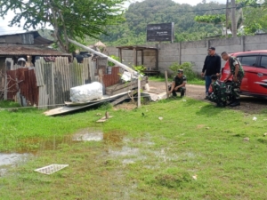 Pastikan Pengukuran Lahan KDKMP Lancar, Babinsa Lakukan Pengawalan