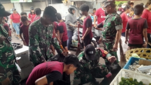 Babinsa Kowad Satu-Satunya di Bali, Serka (K) Widiarkeni Hadiri Grebek Sampah HUT Kota Singgasana ke-532