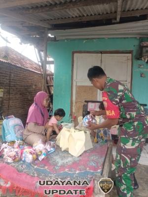 Sertu Dahlan Dampingi Program Makan Sehat Bergizi di Posyandu Pamongo Seteluk Rea