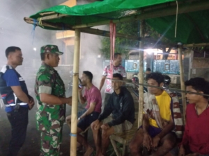 Kegiatan Siskamling di Wilayah Teritorial Koramil Woha Berjalan Lancar dan Aman