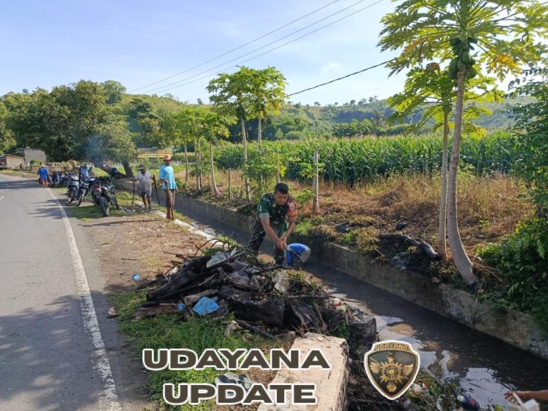 Babinsa Koramil 1614-04/Kilo Pimpin Gotong-Royong Bersihkan Irigasi di Malaju