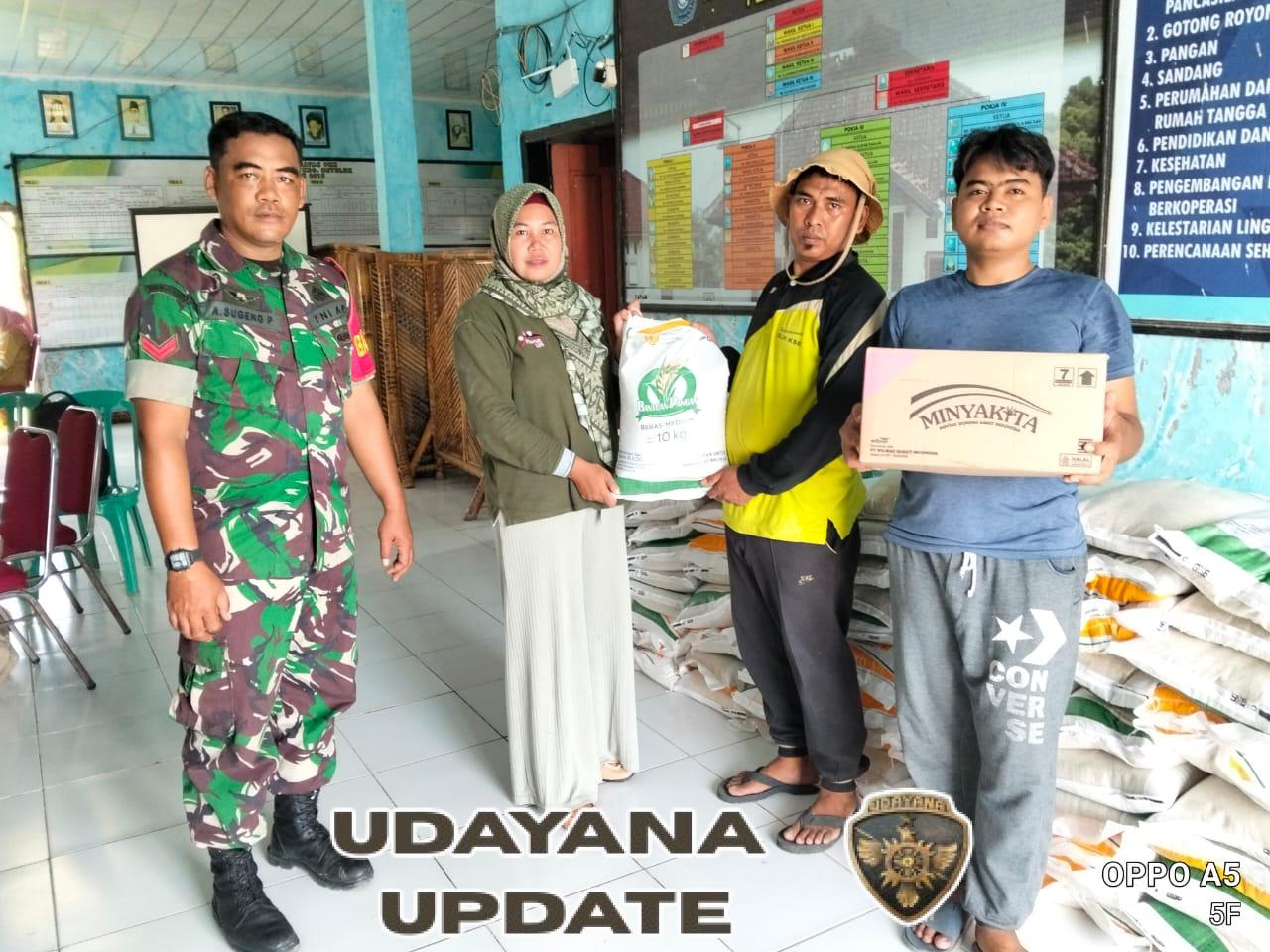 Babinsa Desa Seran Kawal Penyaluran Bantuan Pangan Tahap I Tahun 2025, Pastikan Masyarakat Terlayani Aman dan Tertib