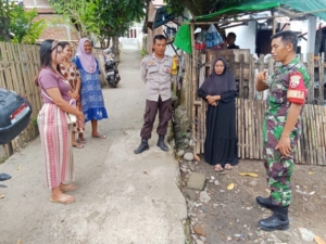 Babinsa dan Bhabinkamtibmas Ajak Warga Lingkungan Jado Jaga Kebersihan dan Kamtibmas