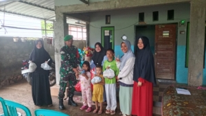 Babinsa Koramil Taliwang Dampingi Program Makan Bergizi Gratis di Posyandu Kelurahan Kuang