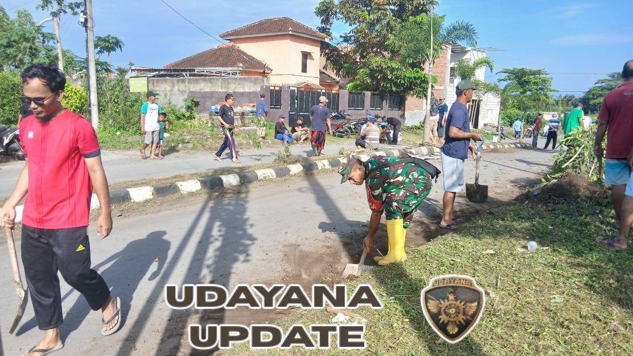 Babinsa Telagawaru Ajak Warga Bersihkan Saluran Air