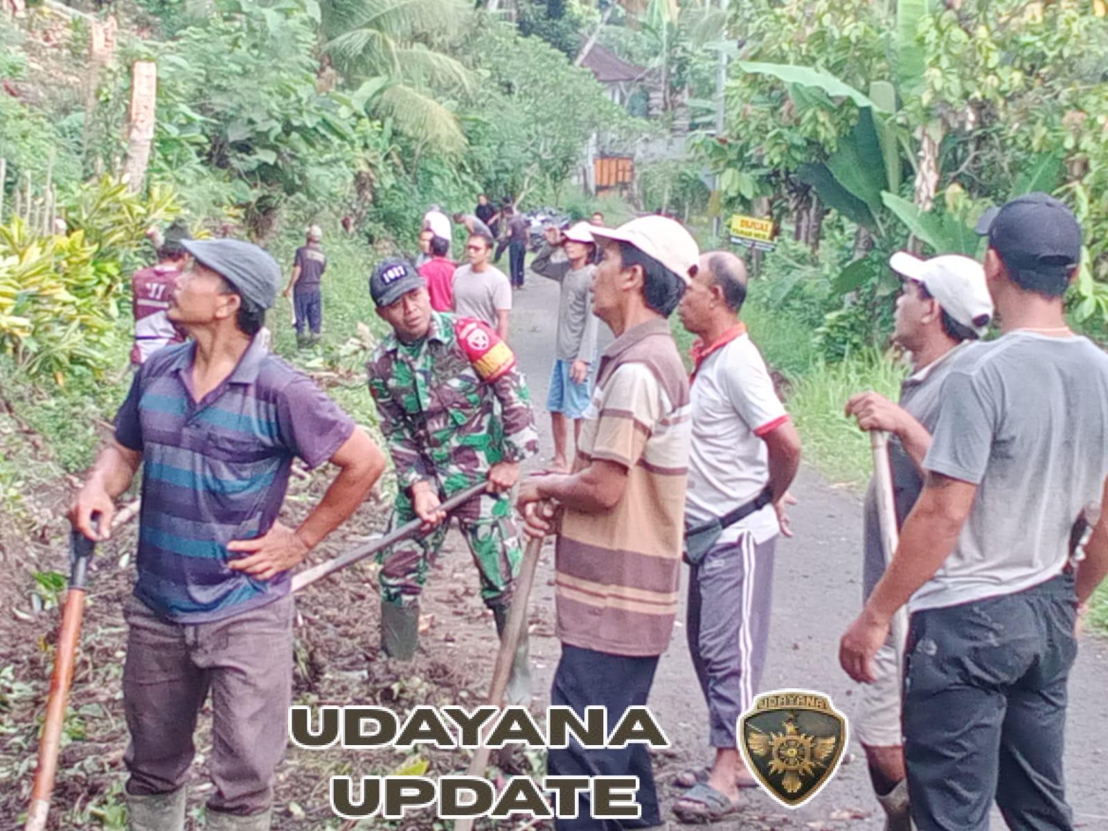 Babinsa Kopka Ardana Ajak 80 Warga Jembrana Gotong Royong, Selamatkan Perpustakaan Sekolah dari Ancaman Longsor!