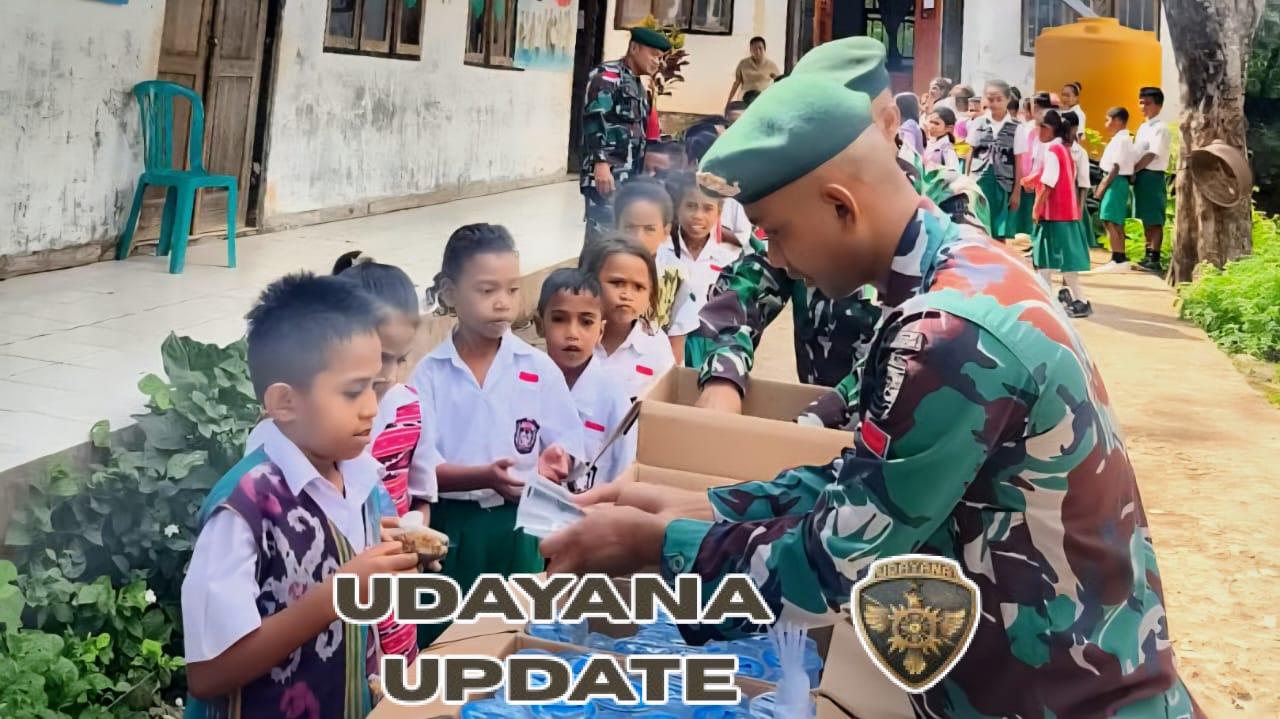 Satgas Pos Maubusa Bagikan Nasi Kuning Gratis untuk Siswa SD Inpres Beitaus