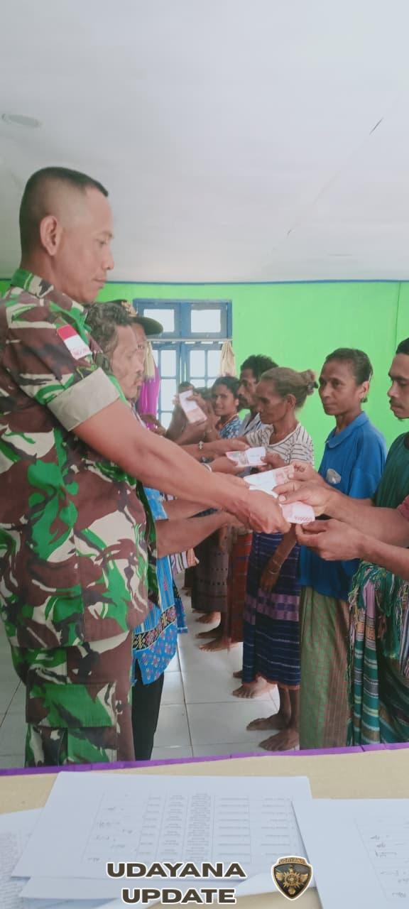 Babinsa Bonmuti Dampingi Penyaluran Bantuan BLT Tahap Dua
