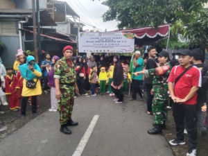 Babinsa Tabanan Dampingi Jalan Santai Milad Muhammadiyah ke-113