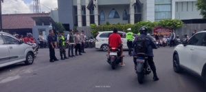 Babinsa, Linmas, dan Pecalang Jaga Natal Damai