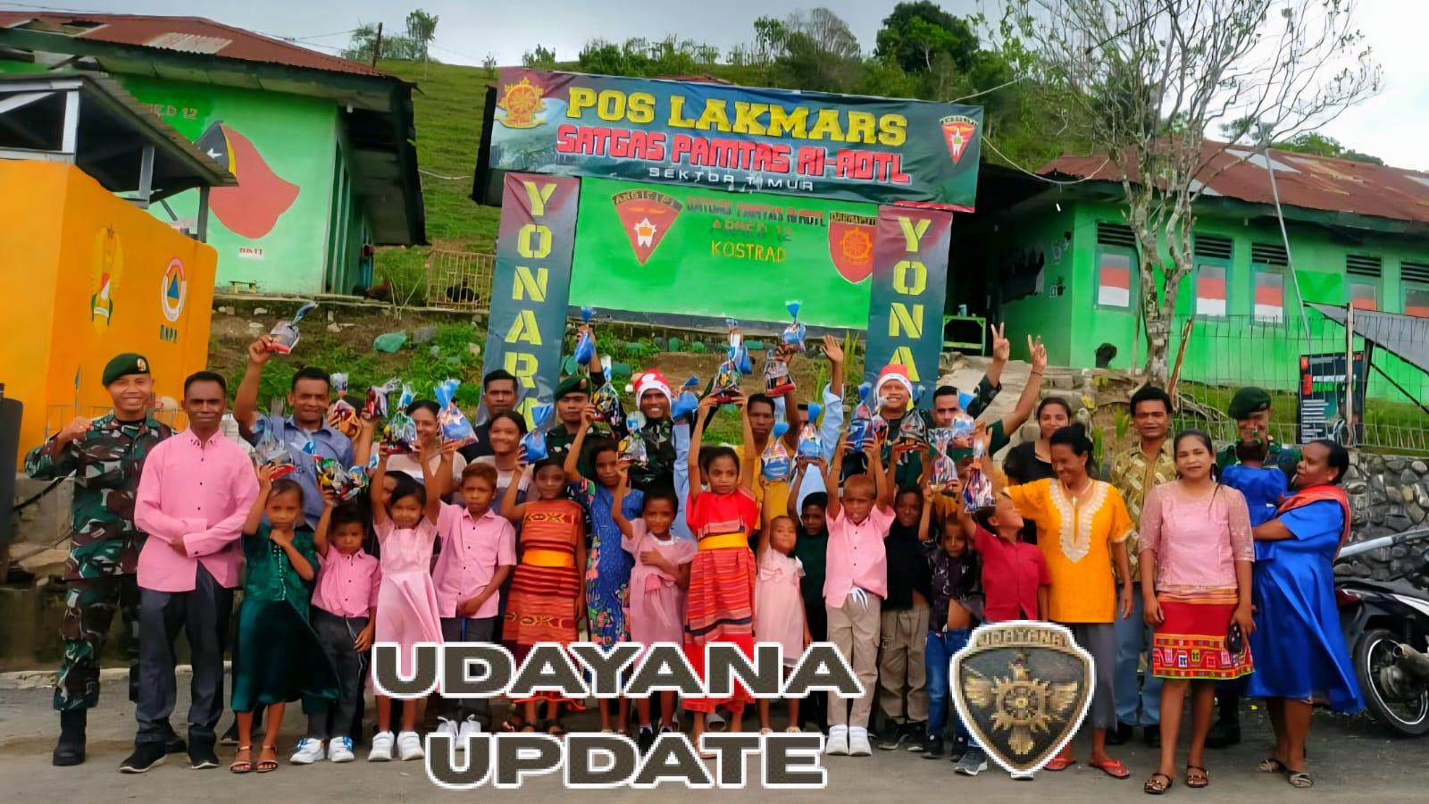 Senyum Anak-Anak Warnai Natal Bersama Satgas Pamtas Pos Lakmars