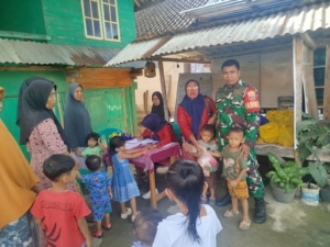 Babinsa Menala Dampingi Program Makan Bergizi Gratis di Posyandu Teluk KTC