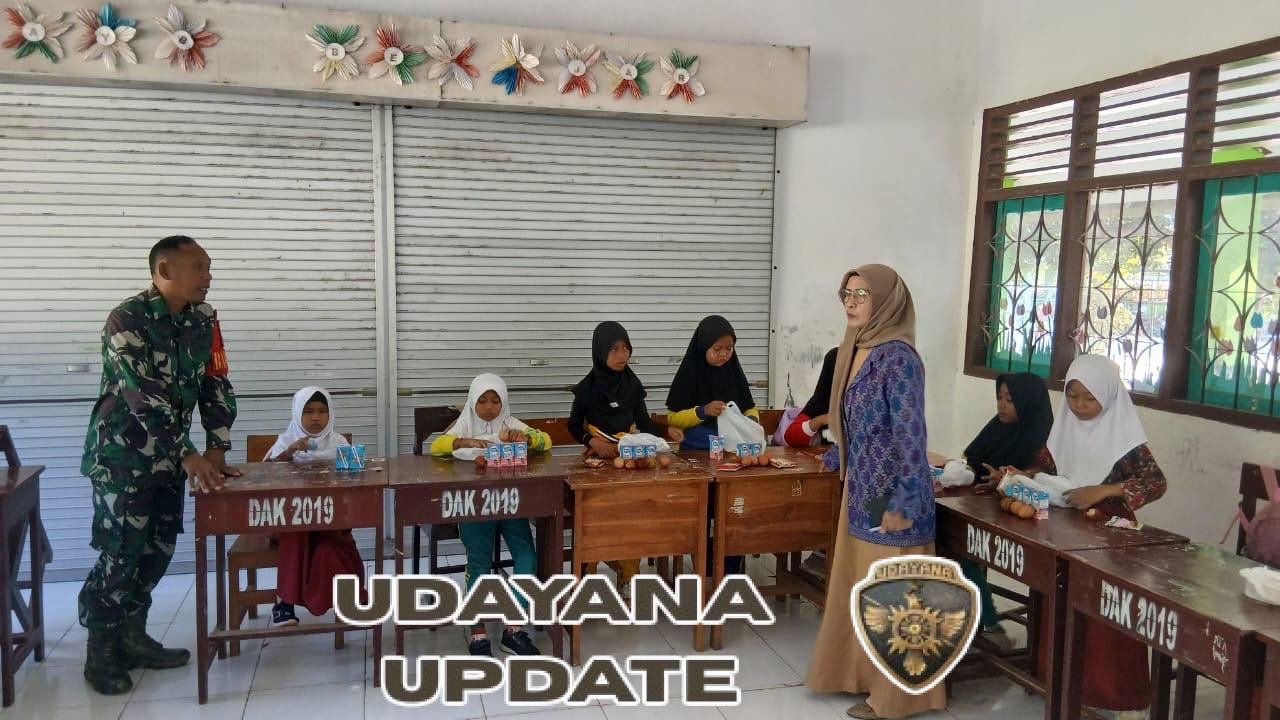 Babinsa Koramil Taliwang Dampingi Program Makan Bergizi Gratis di SDN 7 Taliwang