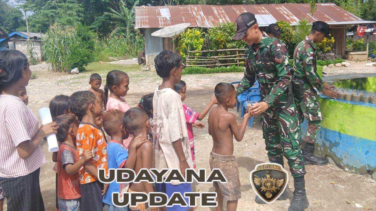 Wujud Kepedulian, Yonarmed 12 Kostrad Bagikan Bubur Kacang Hijau di Desa Tohe