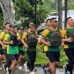 Gunakan Bodyvest, Prajurit Satgas Pamtas Lari Pagi 5K di Atambua