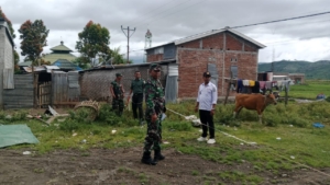 Babinsa O’o Dampingi Pengukuran Lahan Pembangunan Koperasi Merah Putih