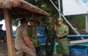 Babinsa Labuan Pandan Bersama Linmas dan Pol PP Laksanakan Monitoring Wilayah Desa