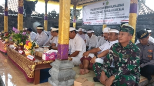 Danramil Mendoyo Hadiri Pengukuhan Bendesa Adat Munduk Anggrek Kaja, Tekankan Sinergitas TNI dan Tokoh Adat.