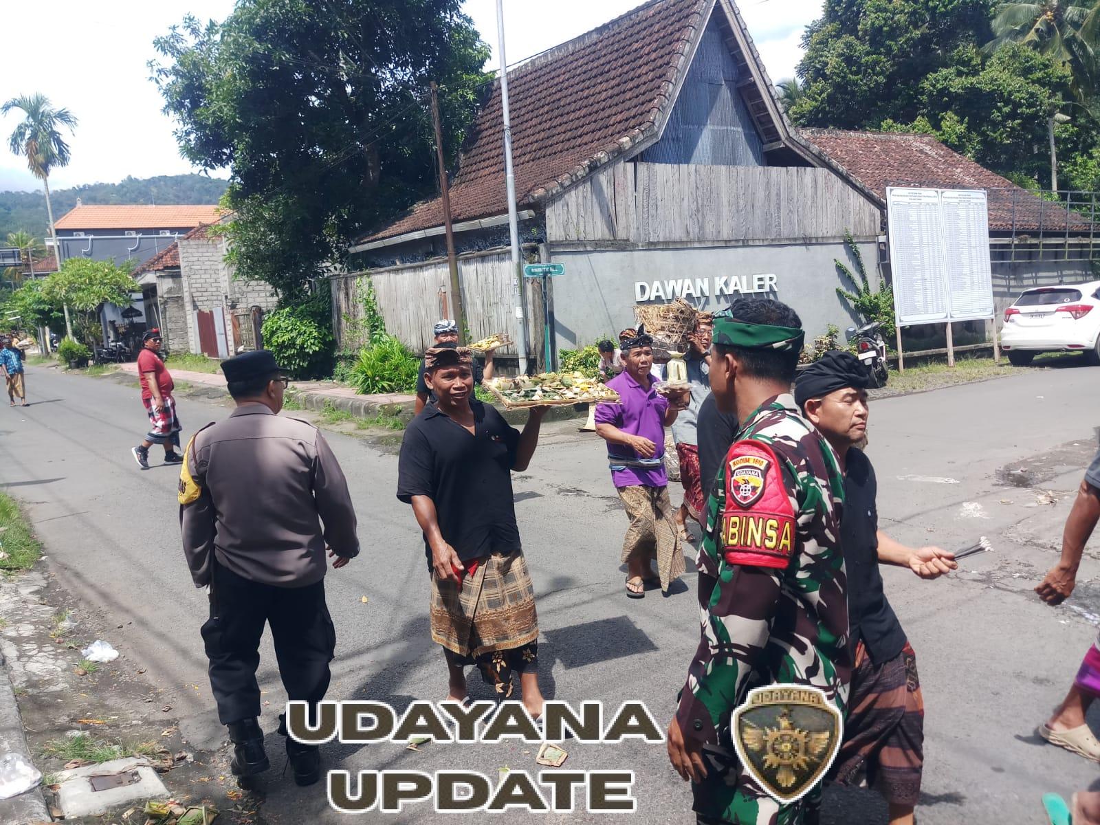 Babinsa Koramil Dawan Gelar Pengamanan Upacara Keagamaan Di Banjar Metulis