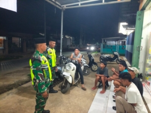 Sinergi Koramil Sape dan Masyarakat Desa Lanta Pantau Situasi dan Antisipasi Kejahatan