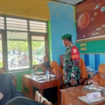 Babinsa Desa Beru Dampingi Program Makan Bergizi di SDN 3 jereweh