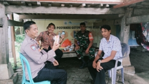 Babinsa Koramil Taliwang Dampingi Program Makan Bergizi Gratis di Posyandu Menala