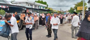 Sertu Faruk Kawal Jalannya Pawai Ta’aruf Menuju MTQ Tingkat Kelurahan