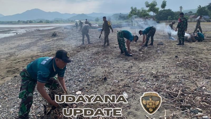 Yonarmed 12 Kostrad dan Brimob Bersihkan Pantai Joni dalam Karya Bakti Perbatasan