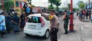 Babinsa Buruan Bersinergi Amankan Prosesi Ngaben Istri Bendesa Adat, Upacara Berlangsung Khidmat dan Tertib