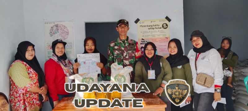 Babinsa Serda Effendi Dampingi Distribusi Bantuan Pangan di Aula Desa Maluk