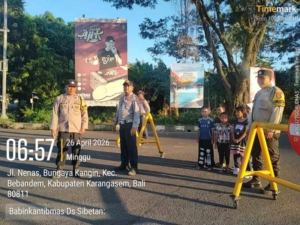 Polsek Bebandem Kawal Keamanan Car Free Day di Jalur 11 Veteran Barat