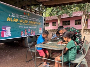 Membaca Buku Membangun Ilmu, Satgas Yonarhanud 2 Kostrad Nyalakan Pelita Literasi Melalui Program Alap Alap Smart Car