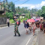 Danramil Dawan Terjunkan Babinsa Kawal Upacara Keagamaan