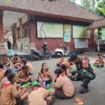 Babinsa Sawan Kaler Dampingi Program Healthy School Meals Yayasan Scholars Of Sustenance (SOS) Bali