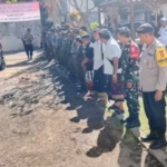 Babinsa Tegak Atensi Penilaian Lomba Satkamling