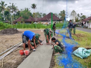Progres pembangunan lapangan voly oleh Satgas TMMD ke – 128 Kodim 1623/Karangasem capai 80 persen