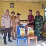 TNI Hadir untuk Rakyat, Koramil Reok Amankan Penyaluran Bantuan Pangan di Desa Rura